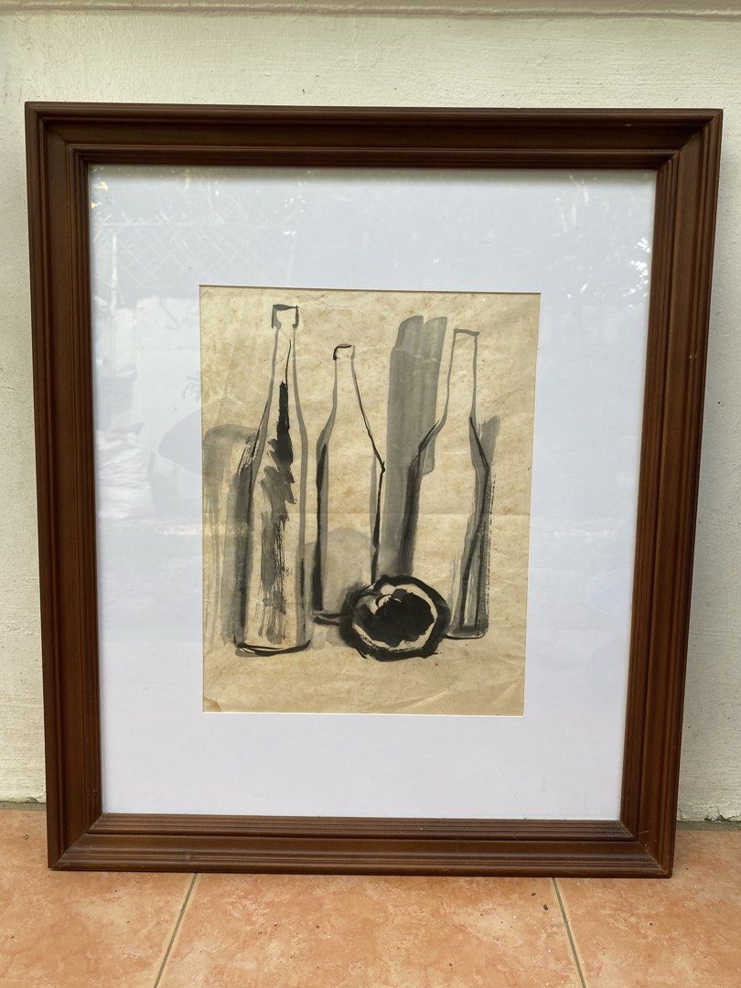 Still life by Master Florencio Concepcion (Category: Art & Prints) located in Malolos. Submitted by jjantiques (Listing ID 1465640564, Image 1). Description: Still life by Master Florencio Concepcion Medium: Watercolor Size: 11 inches x 14 inches (excluded size of frame) - Original still life painting created with black ink on textured paper - Features a composition of three bottles and a piece of cut fruit - Beautifully mounted inside a clean wh