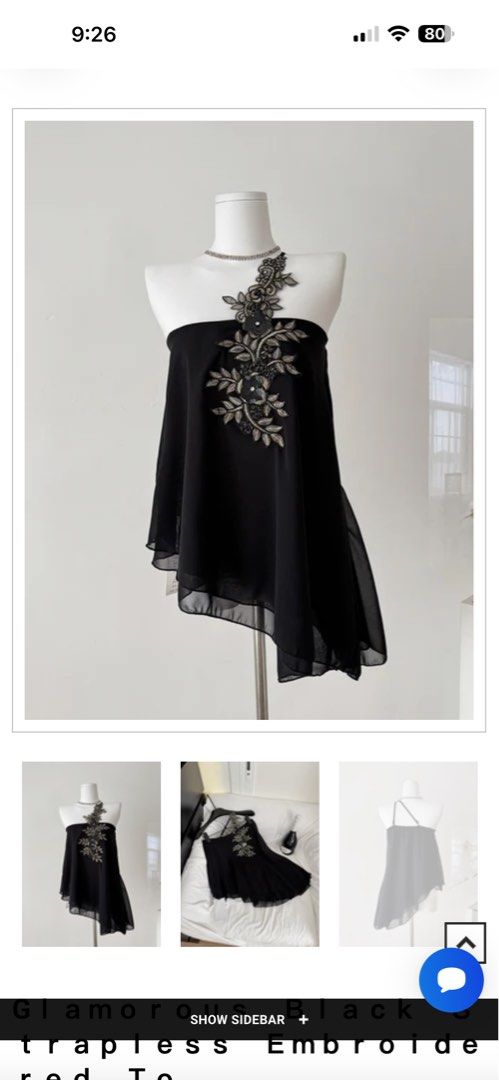 Strapless top (Category: Sleeveless) located in Pototan. Submitted by tres_190725 (Listing ID 1465701590, Image 3). Description: This glamorous black strapless top is a statement piece that combines elegance with a touch of luxury. The flowing chiffon fabric drapes gracefully, while the intricate floral embroidery in metallic threads adds a dazzling effect. The asymmetric hemline gives it a modern edge. Ideal for evening events or special occasio