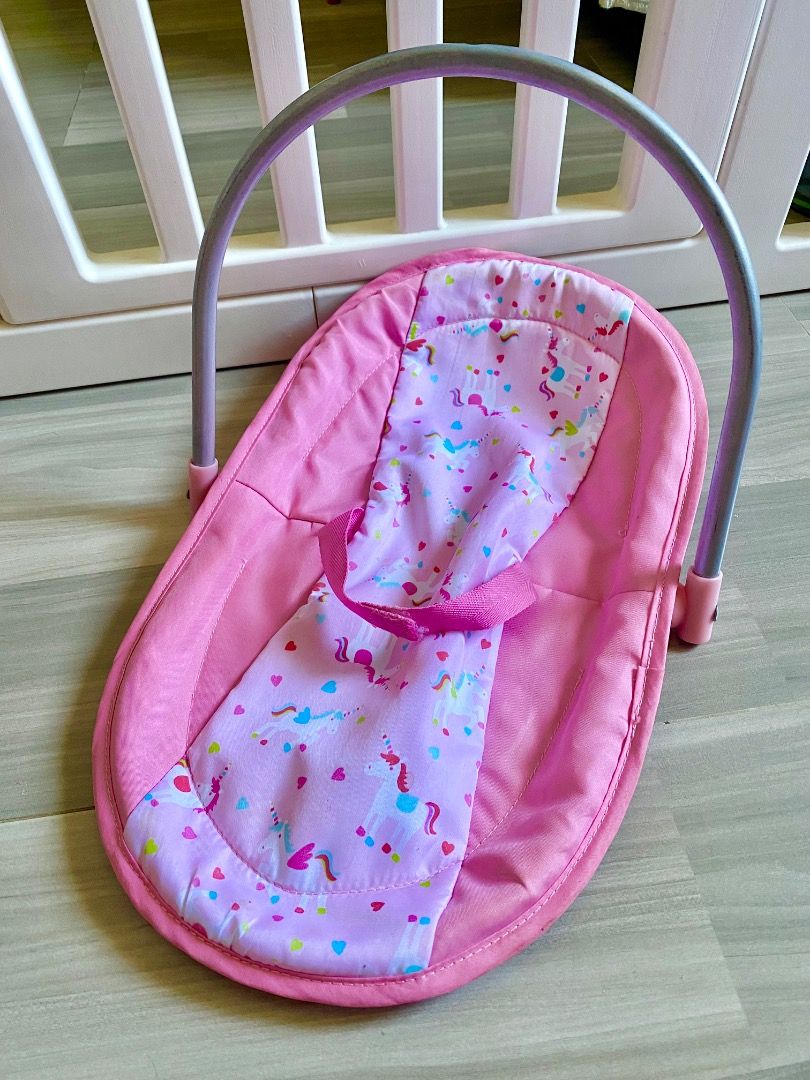 Stroller and carrier w/ mini potty (bundle) (Category: Kids Toys) located in Bauang. Submitted by tinyhandspreloved (Listing ID 1465717155, Image 3). Description: - Complete pink doll accessories playset bundle for pretend play - Foldable strawberry print stroller for easy storage (with minimal flaw) - Authentic Lissi Bätz GmbH unicorn carrier seat with CE tag - Includes a small pink potty bowl - All pieces are clean, well-maintained, and ready f