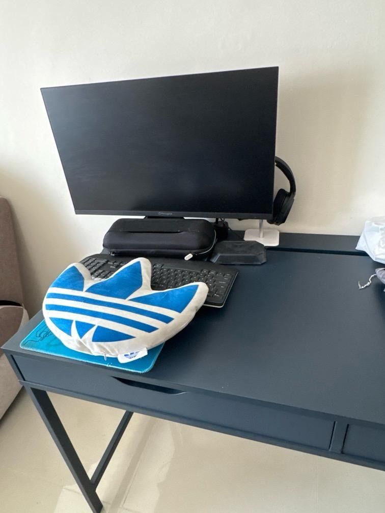 Study Table / Computer Table (Category: Tables & Sets) located in Singapore. Submitted by assshhhh (Listing ID 1465583010, Image 1). Description: study / computer table with minor scufs that u can see in picture. Wooden top metal legs. 2 drawers and wire hiding compartment at the back. Width: 60cm , Length: 131.6cm. Please arrange own transport or will charge extra. Able to nego slightly.