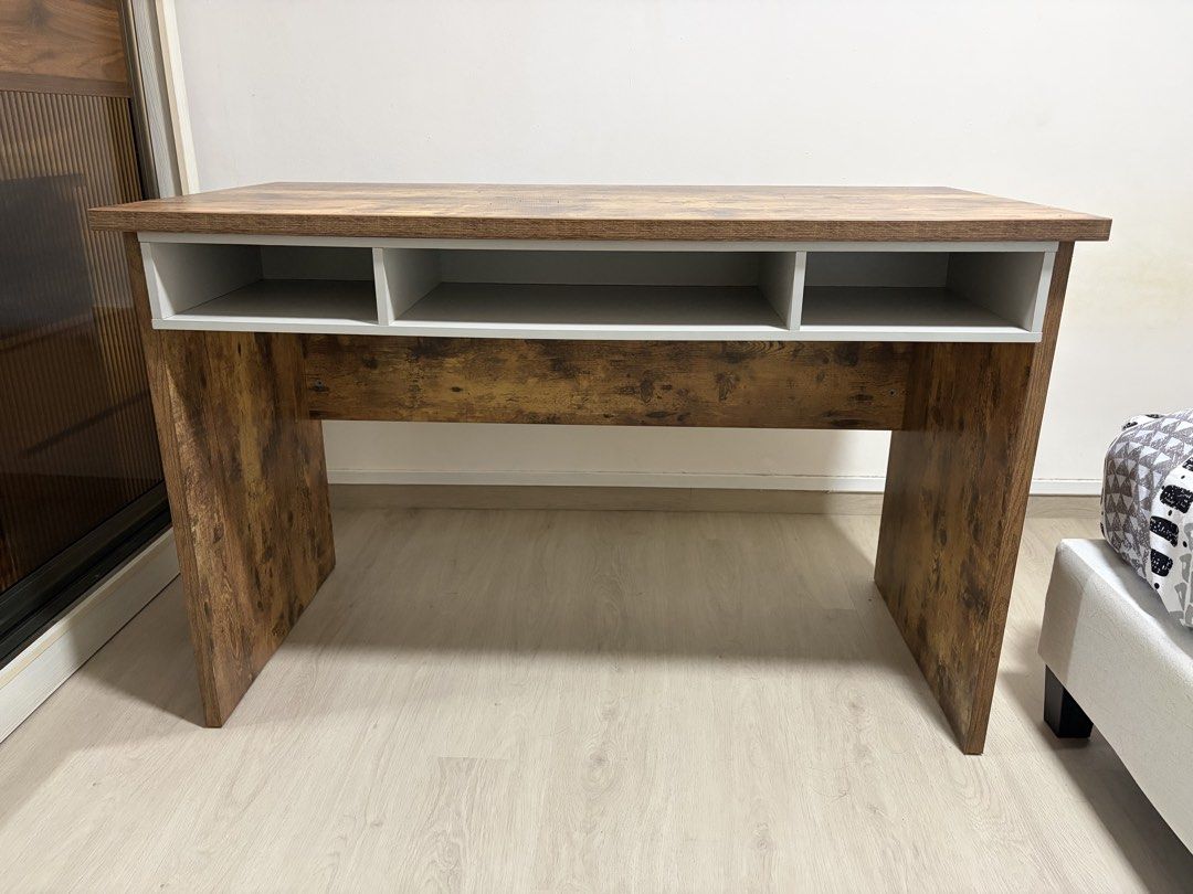 Study/computer desk (Category: Other Home Furniture) located in Singapore. Submitted by nuriqbal_shop (Listing ID 1465608002, Image 1). Description: Measurement: 64cm (depth) by 76.5cm (height) by 123cm (length) self collect bukit gombak or arrange your own transportation. need to clear asap. Able to negotiate for fast deal. only table.