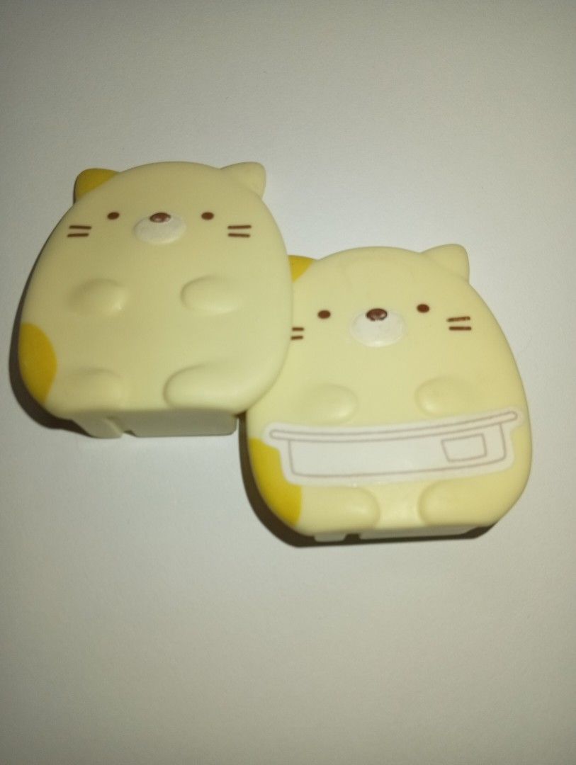 (San-X) 2 Sumikko Gurashi Retainer Case (Neko) (Category: Figurines & Statues) located in Tarlac. Submitted by kaizer_rabbit (Listing ID 1465680640, Image 1). Description: Sumikko Gurashi Retainer Case (Neko) Brand: San-X (Specifically produced as a specialized dental clinic novelty/exclusive distribution item in Japan, McDonald's 2025) with markings at the back of the Sumikko Origin: Designed in Japan 🇯🇵, made in China 🇨🇳 350php for these 2 
