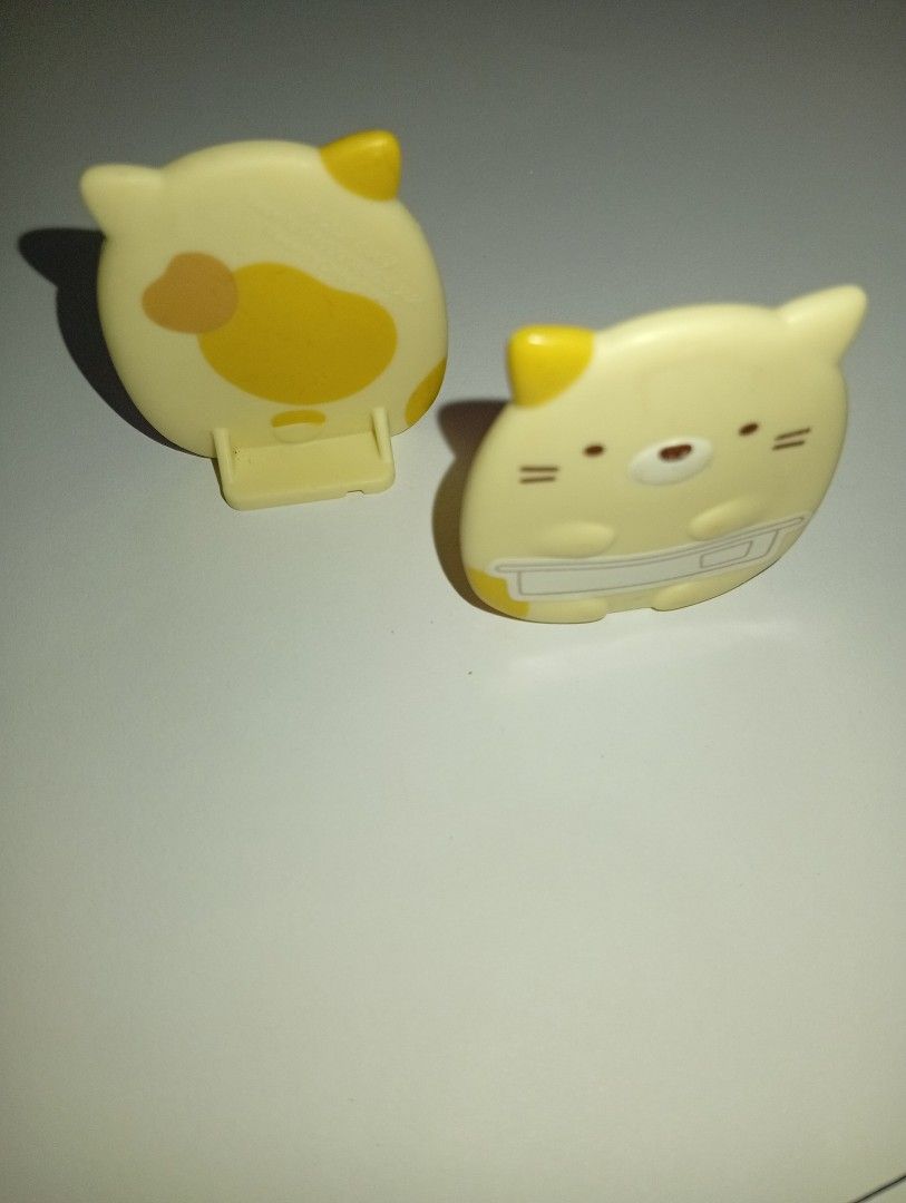 (San-X) 2 Sumikko Gurashi Retainer Case (Neko) (Category: Figurines & Statues) located in Tarlac. Submitted by kaizer_rabbit (Listing ID 1465680640, Image 2). Description: Sumikko Gurashi Retainer Case (Neko) Brand: San-X (Specifically produced as a specialized dental clinic novelty/exclusive distribution item in Japan, McDonald's 2025) with markings at the back of the Sumikko Origin: Designed in Japan 🇯🇵, made in China 🇨🇳 350php for these 2 