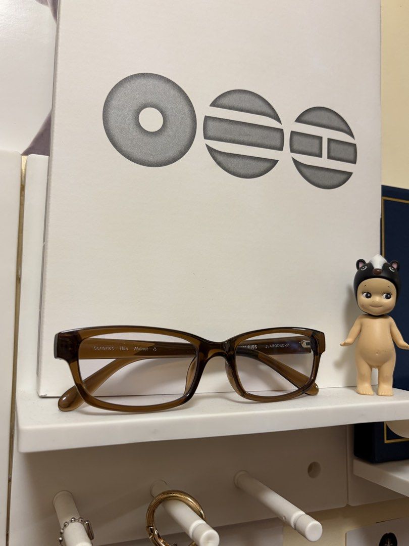 Sunnies Studios Han Walnut Anti-Rad Blue Light Glasses (Category: Sunglasses & Eyewear) located in San Jose del Monte. Submitted by rika.wav (Listing ID 1465627792, Image 3). Description: - Brand: Sunnies Studios - Model/Color: Han Walnut (Rich brown translucent acetate) - Style: Rectangular frame shape - Lenses: Prescription-free, blocks glare and reduces screen fatigue - Condition: Clean, hardly worn - Inclusions: Matching blue storage pouch wi