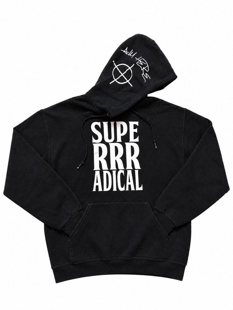 Super Radical Aim Here Hoodie (Category: Coats, Jackets and Outerwear) located in Agdangan. Submitted by theftpplug (Listing ID 1465580116, Image 1). Description: - Brand: Super Radical - Color: Black with big white text on the chest - Material: Thick cotton with cozy fleece lining inside - Details: Drawstrings with braided ends, graphic and handwriting print on the hood - Pocket: Front kangaroo pocket - Fit: Comfortable inner-printed size label 