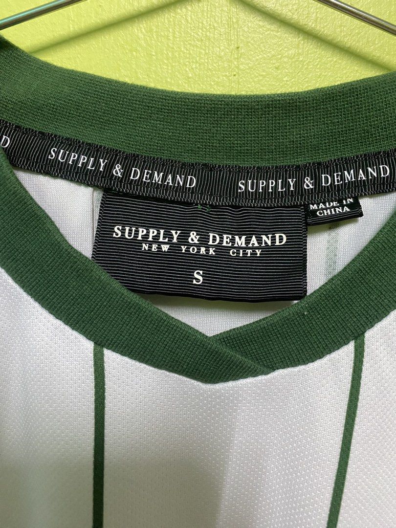 Supply & Demand Tee (Category: Tshirts & Polo Shirts) located in Batu Pahat. Submitted by aremin2912 (Listing ID 1465745821, Image 3). Description: Supply & Demand Tee Size on tag S Pit 21.5 Labuh 28 Asking RM40 including postage.