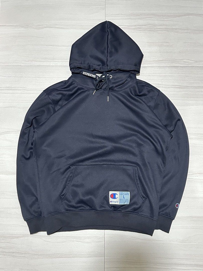 Supreme x Champion Hoodie (Category: Hoodies) located in Manila. Submitted by blessed.drei (Listing ID 1465722615, Image 1). Description: In Good Condition Width : 22 Length 28 Size Large ₱450 + Shipping 📍 Deca Homes, Manila.