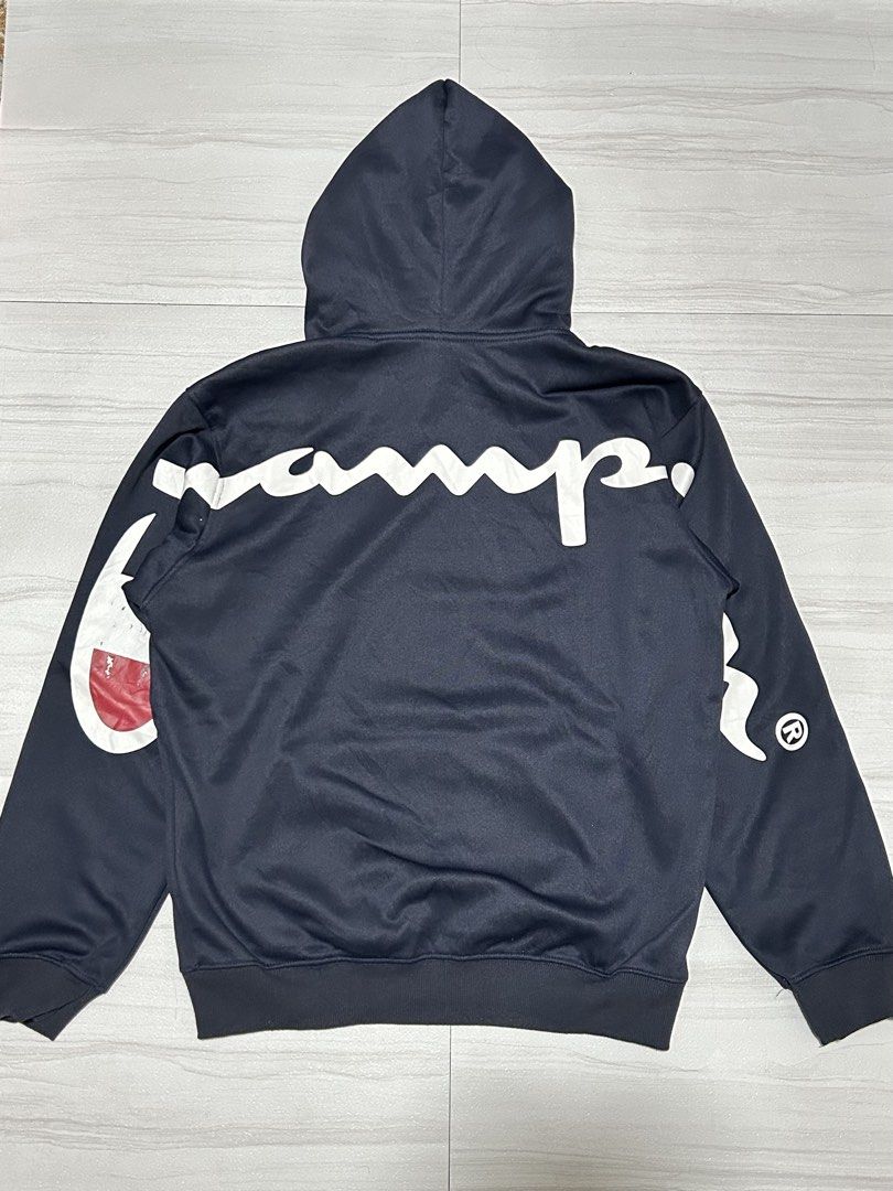 Supreme x Champion Hoodie (Category: Hoodies) located in Manila. Submitted by blessed.drei (Listing ID 1465722615, Image 2). Description: In Good Condition Width : 22 Length 28 Size Large ₱450 + Shipping 📍 Deca Homes, Manila.