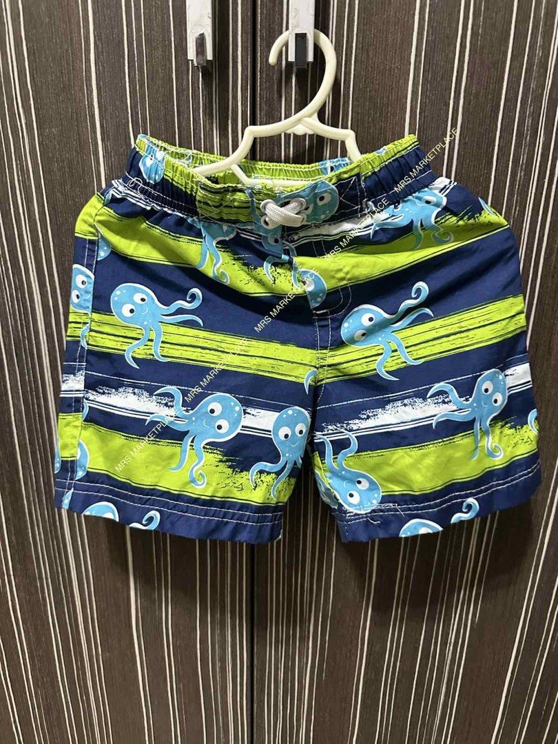 Swim Trunks for Toddlers (Category: Babies & Kids Fashion) located in Manila. Submitted by miladyrs (Listing ID 1465697299, Image 1). Description: - Brand/Style: Wippette Swim trunks - Design: Blue and Lime green shorts, with octopus print - Size: 24 Months - Features: Elastic waistband, white adjustable drawstring, and built-in white mesh lining - Great for beach days and pool trips.