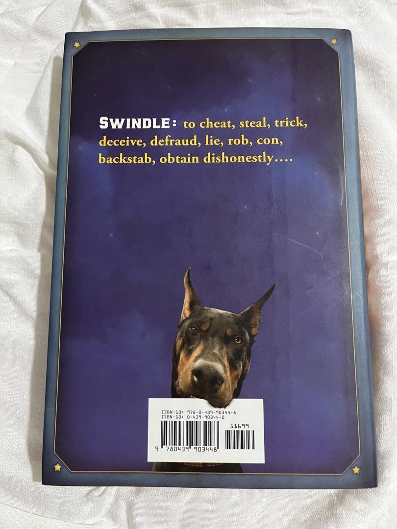 SWINDLE by GORDON KORMAN (Category: Storybooks) located in Cavite. Submitted by thaliaprlvd (Listing ID 1465679288, Image 2). Description: HARD COVER.