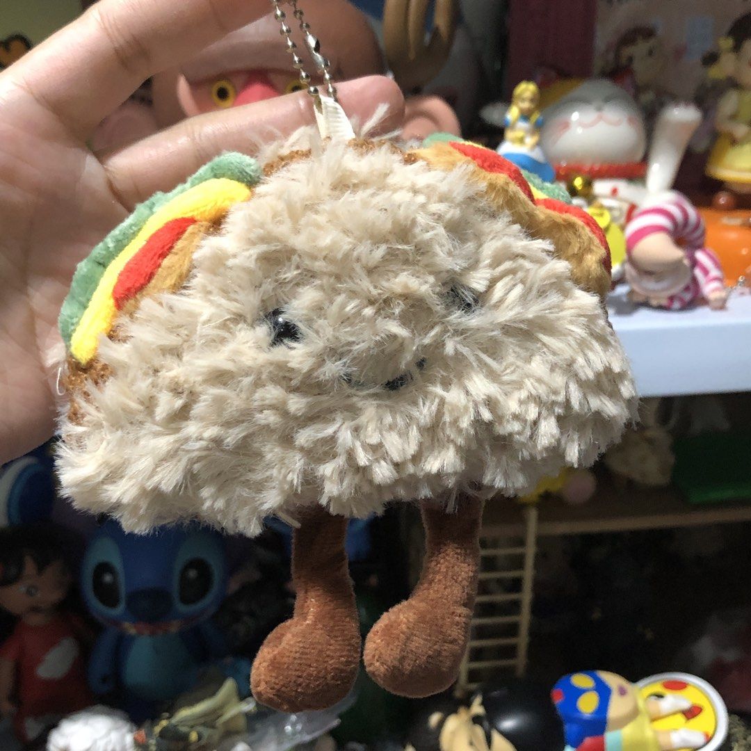 Taco Fun Keychain Cute Plush Charm (Category: Plushies & Soft Toys) located in Quezon City. Submitted by kitsune.treasures (Listing ID 1465652927, Image 2). Description: *First to pay policy! *1 day reservation only. Failure to pay on time, auto cancel. 📍Quezon City * MOD: J&T | Lalamove * MOP: GCASH | BPI 📦ON HAND AND READY TO SHIP! CONDITION: WHAT YOU SEE IS WHAT YOU GET. Dimensions: Kindly check the photos for the actual measurements. Please