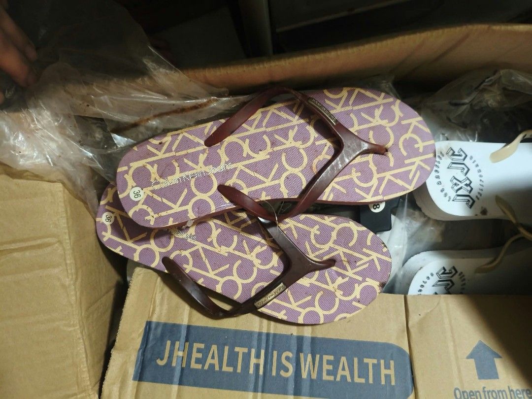TAKE ALL MIXED BRANDS FLIP FLOPS (Category: Slippers and slides) located in Manila. Submitted by shine8889 (Listing ID 1465646199, Image 3). Description: BRAND NEW, STAINED DUE TO STORAGE, CAN BE CLEAN, NEVER WORN, QUALITY OF RUBBER STILL DURABLE, MK, CK BRANDS TAKE ALL..HUNDREDS AND THOUSANDS GOOD FOR BEGINNERS BEST OFFER.
