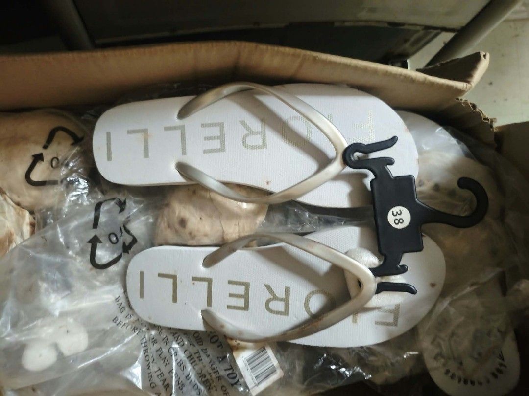 TAKE ALL MIXED BRANDS FLIP FLOPS (Category: Slippers and slides) located in Manila. Submitted by shine8889 (Listing ID 1465646199, Image 1). Description: BRAND NEW, STAINED DUE TO STORAGE, CAN BE CLEAN, NEVER WORN, QUALITY OF RUBBER STILL DURABLE, MK, CK BRANDS TAKE ALL..HUNDREDS AND THOUSANDS GOOD FOR BEGINNERS BEST OFFER.