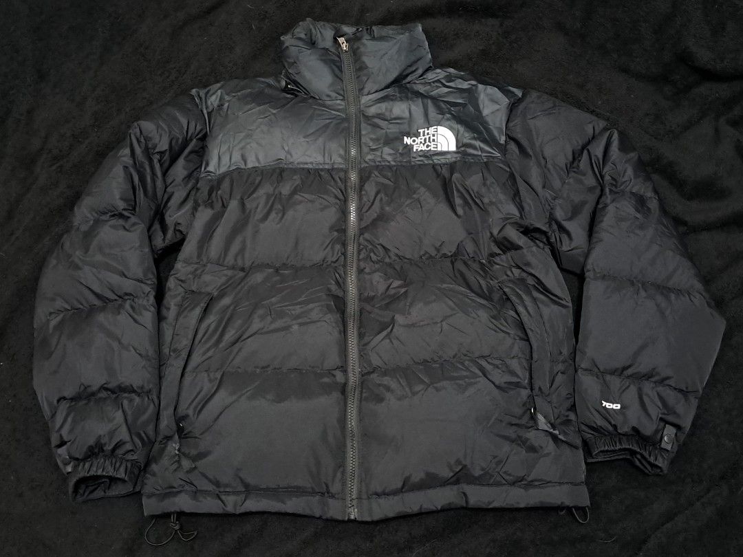 The North Face 700 Nuptse Puffer Jacket Black (Category: Coats, Jackets and Outerwear) located in Puerto Princesa. Submitted by jercksthriftph (Listing ID 1465610192, Image 1). Description: The North Face - Style: Classic 700 Nuptse Down Puffer Jacket Size: Small fit medium 23 x 26 - Color: Solid Black with embroidered white logos (chest and back shoulder) - Size: Men's Small (Made in Vietnam) - Insulation: High fill power quilted down for extrem