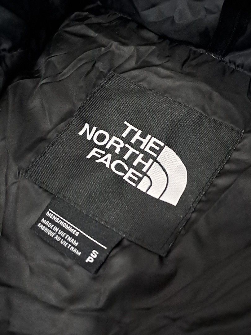 The North Face 700 Nuptse Puffer Jacket Black (Category: Coats, Jackets and Outerwear) located in Puerto Princesa. Submitted by jercksthriftph (Listing ID 1465610192, Image 3). Description: The North Face - Style: Classic 700 Nuptse Down Puffer Jacket Size: Small fit medium 23 x 26 - Color: Solid Black with embroidered white logos (chest and back shoulder) - Size: Men's Small (Made in Vietnam) - Insulation: High fill power quilted down for extrem