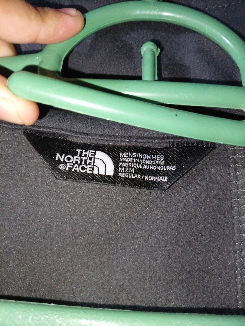 The North Face Men's Fleece Jacket Medium (Category: Coats, Jackets and Outerwear) located in Manila. Submitted by keenphoenix_9ed053 (Listing ID 1465758023, Image 2). Description: - Brand: The North Face - Style: Men's Fleece Jacket - Size: Medium (Regular Fit) - Color: Dark Grey - Origin: Made in Honduras - Condition: Clean fabric finish, comfortable layer for cooler weather - Details: Standard interior collar tag intact NOTE: ONLY USED ONCE.