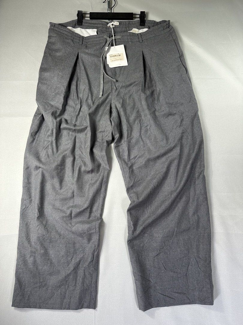 The Row Concrete Davian Pleated Pants (Category: Luxury Apparel) located in Cabanglasan. Submitted by thefashiongarage.co (Listing ID 1465610842, Image 1). Description: Title - The Row Model/Name - Cocrete Davian Pants Size on Tag - 36 Conditiion - Brand new with hangtag Dimension (WxLxH) - 18-20x 42.5x10.5 Inches For Big Boys - The Waist is adjustable with Waist Lace Category- Pleated/Luxury/Casual Fitting - Wide Leg/ Loose Made in - USA Materia