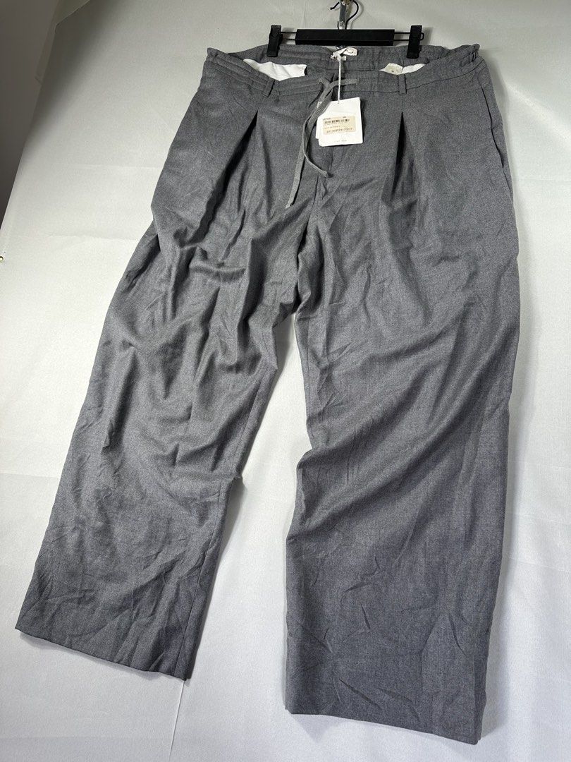 The Row Concrete Davian Pleated Pants (Category: Luxury Apparel) located in Cabanglasan. Submitted by thefashiongarage.co (Listing ID 1465610842, Image 2). Description: Title - The Row Model/Name - Cocrete Davian Pants Size on Tag - 36 Conditiion - Brand new with hangtag Dimension (WxLxH) - 18-20x 42.5x10.5 Inches For Big Boys - The Waist is adjustable with Waist Lace Category- Pleated/Luxury/Casual Fitting - Wide Leg/ Loose Made in - USA Materia