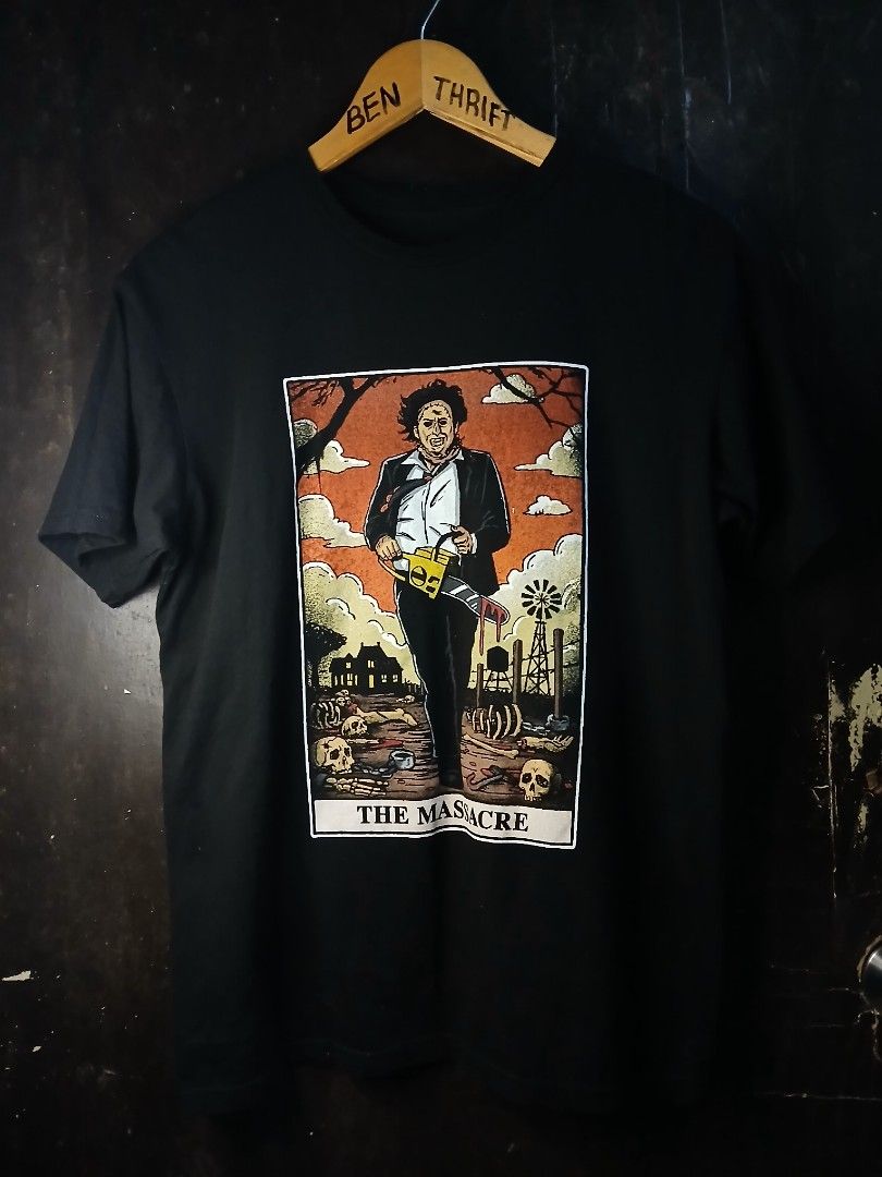 The Texas Chainsaw Massacre Graphic Tee (Category: Tshirts & Polo Shirts ) located in Caloocan City. Submitted by benthriftshp (Listing ID 1465739457, Image 1). Description: - Item: Official 1974 Leatherface horror movie t-shirt - Color: Black - Size: Medium (interior neck tag) - Material: Cotton blend (Made in Honduras) - Design: Large graphic print on the front, crew neckline, short sleeves - Condition: Great for slasher and horror film fans 50