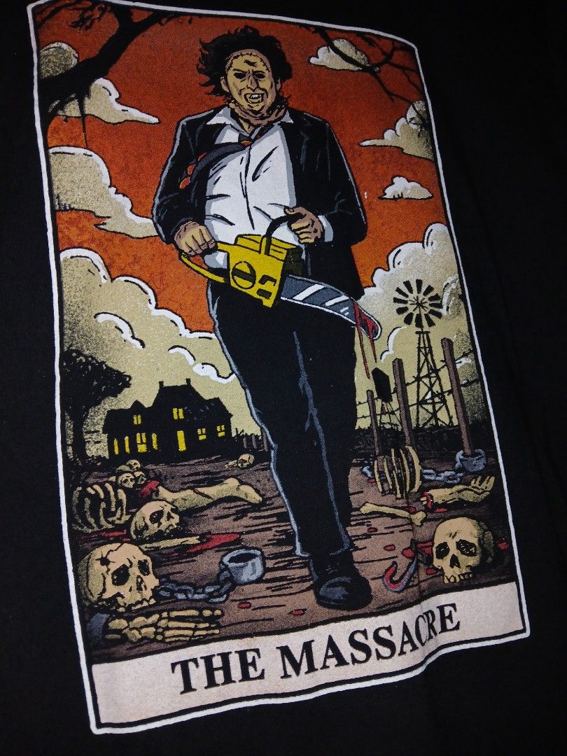 The Texas Chainsaw Massacre Graphic Tee (Category: Tshirts & Polo Shirts ) located in Caloocan City. Submitted by benthriftshp (Listing ID 1465739457, Image 2). Description: - Item: Official 1974 Leatherface horror movie t-shirt - Color: Black - Size: Medium (interior neck tag) - Material: Cotton blend (Made in Honduras) - Design: Large graphic print on the front, crew neckline, short sleeves - Condition: Great for slasher and horror film fans 50