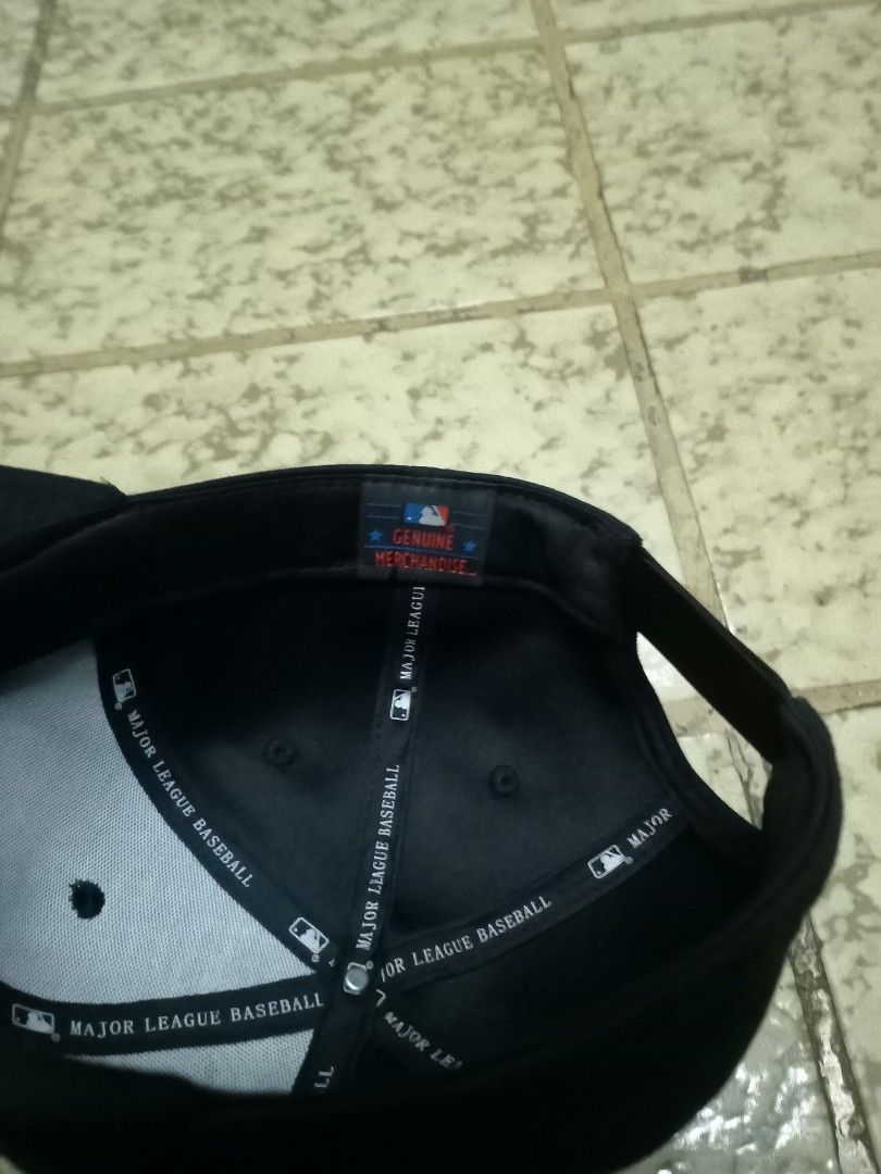 Thrasher Magazine Flame Logo Black Cap Snapback (Category: Caps & Hats) located in Aguinaldo. Submitted by ukayandthrift (Listing ID 1465615769, Image 3). Description: - Color: Classic black - Design: Iconic embroidered Thrasher flame logo on the front - Authenticity: Features official MLB Genuine Merchandise taping and interior tag - Fit: Fully adjustable strap in the back for a custom fit - Quality: Clean fabric with solid stitching throughout 