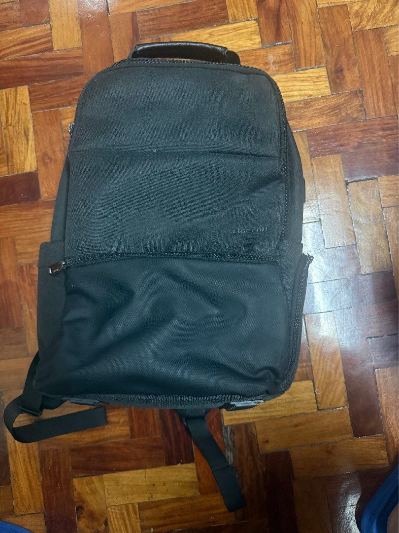 Tigernu Black Travel Laptop Backpack (Category: Backpacks) located in Manila. Submitted by kangaroopouch (Listing ID 1465722139, Image 1). Description: 🎒 Tigernu Laptop Backpack – Black | 15.6” Brand: Tigernu Model: T-B3905M Color: Black Condition: Used ✨ Features: * Fits 15.6” laptops * Splashproof & water-resistant nylon material * Multiple compartments for organized storage * Dedicated laptop sleeve * Front & side pockets * Anti-theft double-