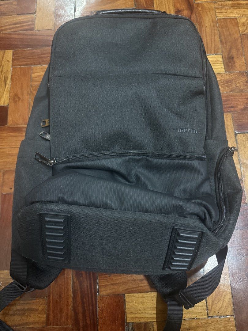 Tigernu Black Travel Laptop Backpack (Category: Backpacks) located in Manila. Submitted by kangaroopouch (Listing ID 1465722139, Image 2). Description: 🎒 Tigernu Laptop Backpack – Black | 15.6” Brand: Tigernu Model: T-B3905M Color: Black Condition: Used ✨ Features: * Fits 15.6” laptops * Splashproof & water-resistant nylon material * Multiple compartments for organized storage * Dedicated laptop sleeve * Front & side pockets * Anti-theft double-