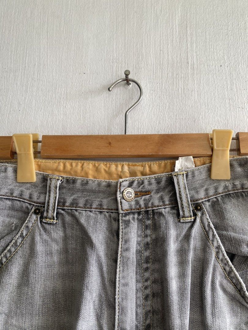 Timberland Grey Denim Cargo Shorts Size 34 (Category: Shorts) located in Manila. Submitted by anthony1723 (Listing ID 1465614735, Image 3). Description: - Brand: Timberland - Item: Denim cargo shorts - Color: Washed grey (vintage, worn-in look) - Size: 34 waist - Material: Heavy-duty cotton - Details: Deep side pockets, back pockets, hammer loop, branded buttons, yellow interior waistband lining, and back leather patch.