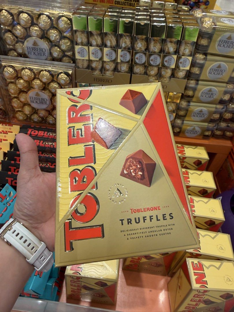Toblerone Truffles Box Chocolate (Category: Packaged & Instant Food) located in Cavite. Submitted by silentowl_983444 (Listing ID 1465595127, Image 2). Description: Teacher’s Day Gift! - up to 60% Off, cheaper compare to Mall price! - 100% authentic and sealed Toblerone Truffles - Freshly sourced straight from the display shelf - Iconic triangular box in classic yellow and red branding - Ideal for gifts, pasalubong, or sharing with loved ones - M