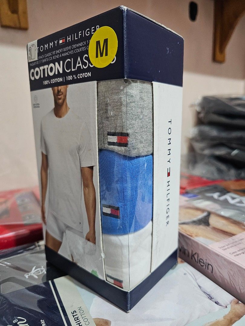 TOMMY HILFIGER 3-Pack Crewneck Shirt - Medium (Category: Tshirts & Polo Shirts ) located in Quezon City. Submitted by senyoramaria2 (Listing ID 1465671735, Image 2). Description: TOMMY HILFIGER Crewneck Shirt Classic Fit Short-sleeve 100% Cotton 3-Pack Gray, Blue, White Medium #USpasabuy.