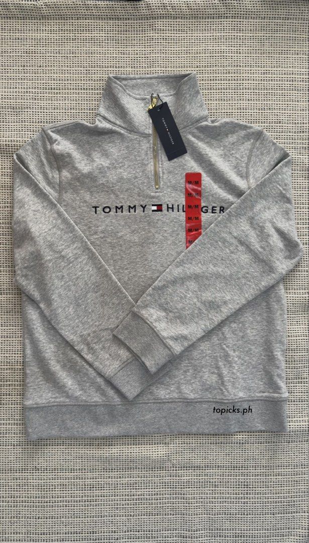 TOMMY HILFIGER quarter zip sweater (Category: Coats, Jackets and Outerwear) located in Malolos. Submitted by topicksph (Listing ID 1465718427, Image 2). Description: TOMMY HILFIGER half zip sweater BNWT size M ~ not fleece 📌 w pin hole near the zipper (not noticeable), pls see last photo Guaranteed authentic.