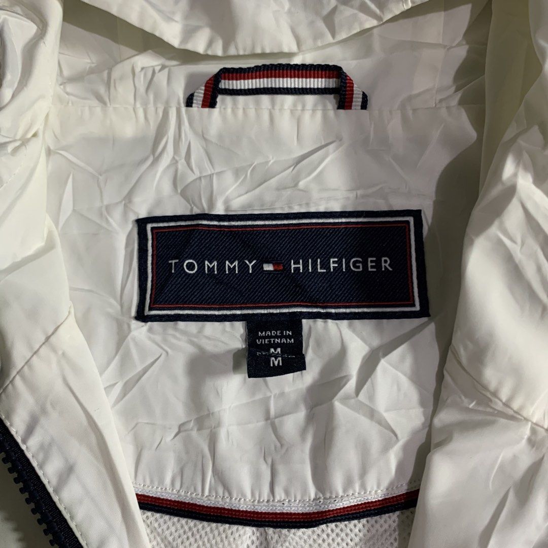 Tommy Hilfiger windbreaker (Category: Coats, Jackets and Outerwear) located in Davao. Submitted by jandyfuert21303 (Listing ID 1465676490, Image 3). Description: Good as new condition Need wash only 21.5x26 Tight ribbings .