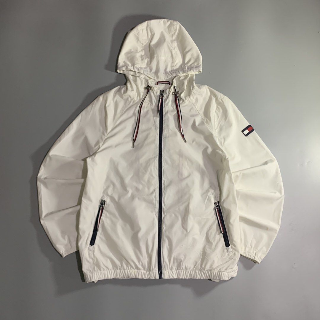 Tommy Hilfiger windbreaker (Category: Coats, Jackets and Outerwear) located in Davao. Submitted by jandyfuert21303 (Listing ID 1465676490, Image 1). Description: Good as new condition Need wash only 21.5x26 Tight ribbings .