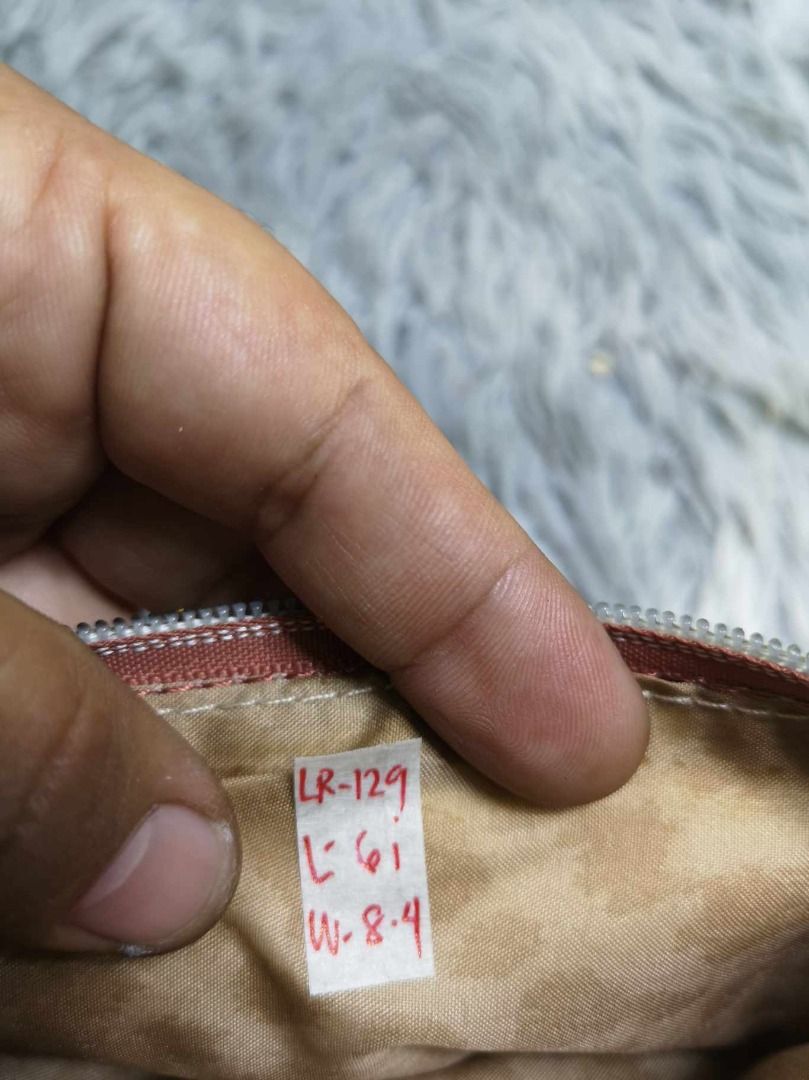 Top Zipper Closure Flat Wristlet Pouch (Category: Purses & Pouches) located in Santa Cruz. Submitted by jmy_surplus.2 (Listing ID 1465688144, Image 2). Description: Size ; L- 6 W - 8.4 Color ; Peach Type ; Wristlet Brand ; No brand Material ; Leather Style ; Peach Zipper Closure Writlet LR 129 JMY 5 Batch #224.