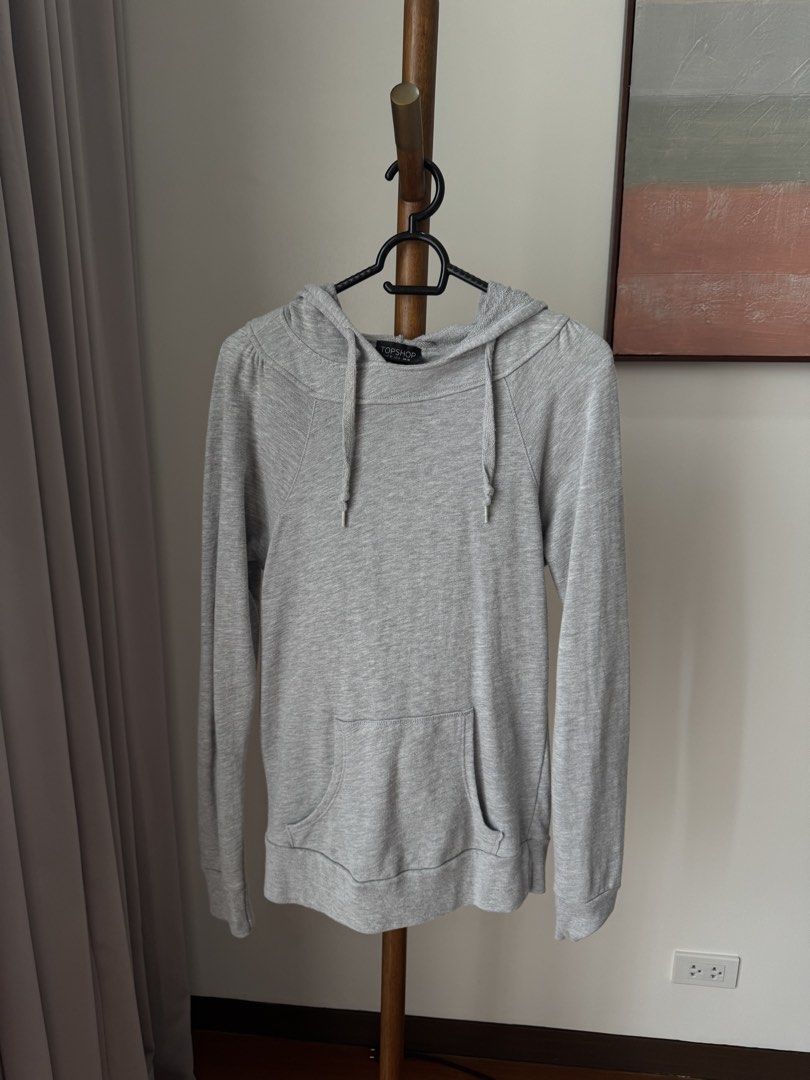 Topshop Grey Hooded Sweatshirt (Category: Coats, Jackets and Outerwear) located in Pasig City. Submitted by kutleyn (Listing ID 1465671942, Image 1). Description: - Brand: Topshop - Color: Grey - Style: Pullover hoodie with adjustable drawstring - Features: Practical front pocket - Size: US 6, UK 10, EUR 38 - Condition: Great for casual, everyday wear.