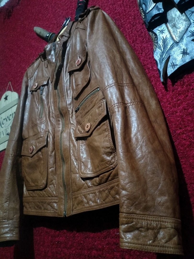 TOUGH JEAN SMITH UTILITY LEATHER JACKET FOR MEN'S (Category: Coats, Jackets and Outerwear) located in Baguio. Submitted by vertex_nga.pow (Listing ID 1465756916, Image 3). Description: TOUGH JEAN SMITH UTILITY LEATHER JACKET FOR MEN'S SMALL SIZE DIMENSION 24.5L BY 19.5 ARMPIT TO ARMPIT 16.5 INCHES SHOULDER TO SHOULDER 26 INCHES SLEEVE COW HIDE LEATHER MATERIAL/ GENUINE LEATHER GOOD CONDITION BAGUIO LOCATION PLUS SF SA MALAYU JNT COURIER PASS COD 