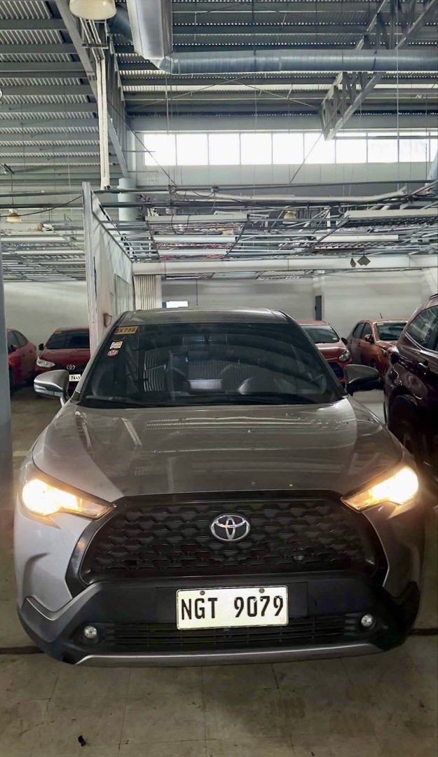 Toyota Corolla Cross 1.8G Auto (Category: Used Cars) located in Taguig. Submitted by prelobyjen (Listing ID 1465725360, Image 3). Description: For Sale 2021 Toyota Corolla Cross 1.8 G Odo: 55k Owner/seller 📍 South Cembo, Taguig Features: - Smart entry - Push start - Headunit - Auto retractable side mirrors - Spacious Cabin - LED Fog lights - Projector headlights - Spare tire with tools - Booklets and manual - Light scratches and light dents - Ne