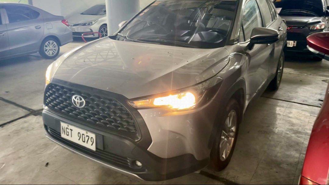 Toyota Corolla Cross 1.8G Auto (Category: Used Cars) located in Taguig. Submitted by prelobyjen (Listing ID 1465725360, Image 1). Description: For Sale 2021 Toyota Corolla Cross 1.8 G Odo: 55k Owner/seller 📍 South Cembo, Taguig Features: - Smart entry - Push start - Headunit - Auto retractable side mirrors - Spacious Cabin - LED Fog lights - Projector headlights - Spare tire with tools - Booklets and manual - Light scratches and light dents - Ne