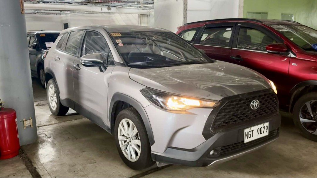 Toyota Corolla Cross 1.8G Auto (Category: Used Cars) located in Taguig. Submitted by prelobyjen (Listing ID 1465725360, Image 2). Description: For Sale 2021 Toyota Corolla Cross 1.8 G Odo: 55k Owner/seller 📍 South Cembo, Taguig Features: - Smart entry - Push start - Headunit - Auto retractable side mirrors - Spacious Cabin - LED Fog lights - Projector headlights - Spare tire with tools - Booklets and manual - Light scratches and light dents - Ne