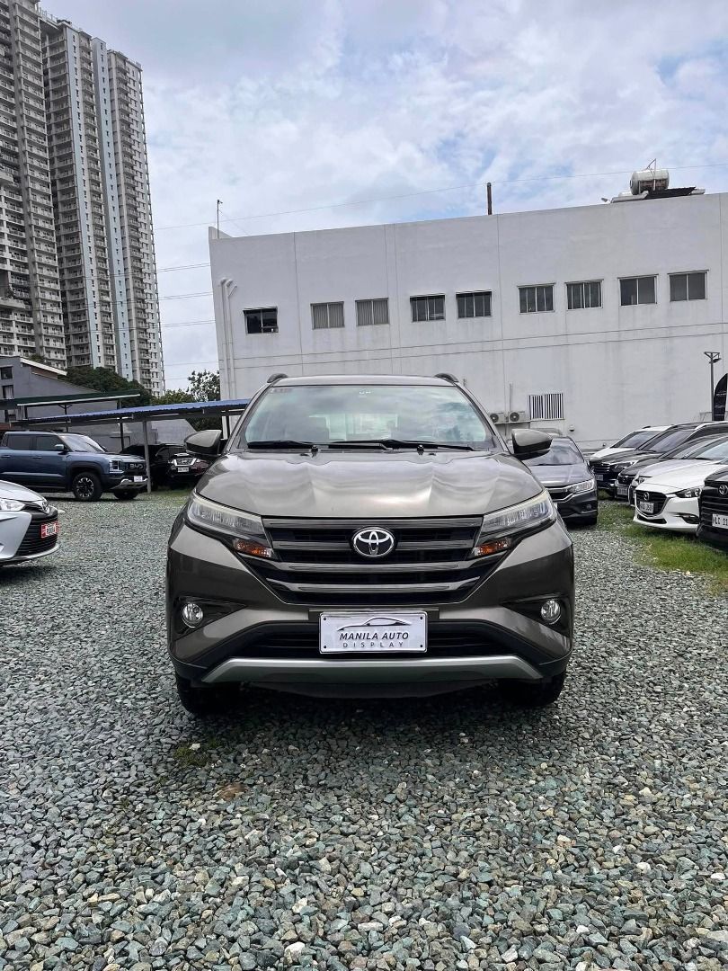 Toyota Rush G 1.5L Auto (Category: Used Cars) located in Pasig City. Submitted by pureocean-057512 (Listing ID 1465665519, Image 1). Description: 2020 TOYOTA RUSH 1.5L G GAS AUTOMATIC TRANSMISSION Downpayment: ₱65,800 ✅ ZERO PROCESSING UNTIL OCT 17 ONLY ✅ ⚠️5 SLOTS LEFT ONLY⚠️ Bronze Mica Metallic 26tkms mileage Automatic Transmission 1.5L Gasoline Engine 3 ending plate Spacious 7 seater Touch Screen with FM/USB/Aux/Bluetooth Anti-lock Braking Sy