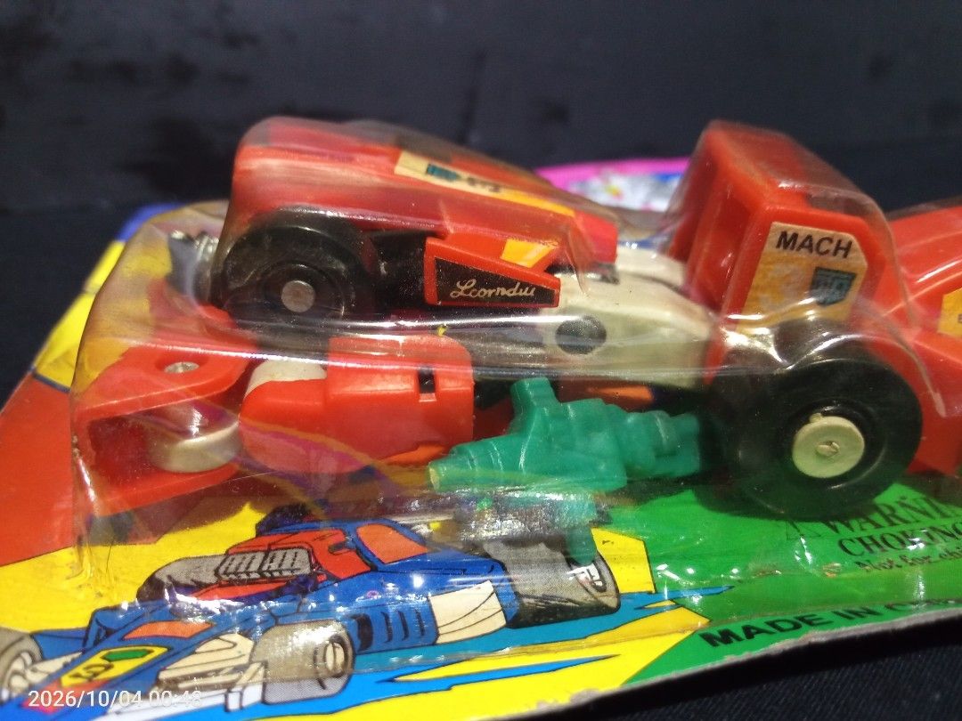Transformable F-1 Robot (Category: Vintage Collectibles) located in Davao. Submitted by banana.pancake (Listing ID 1465744767, Image 2). Description: Bootleg Palengke toy, but the materials is very heavy..