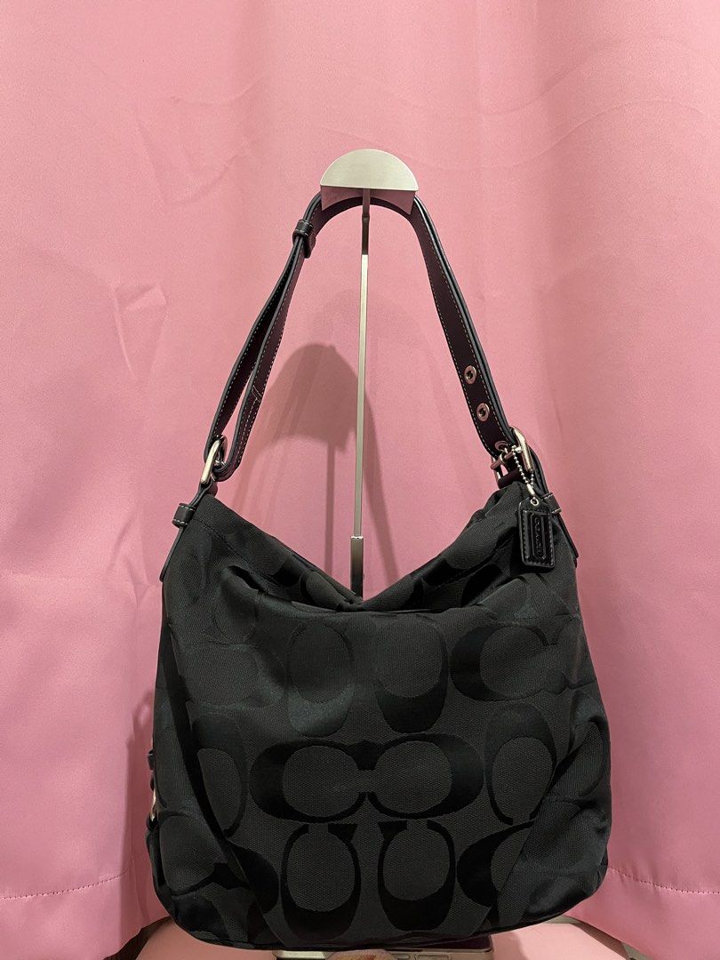 Triple Black Medium Two Way Signature Canvas (Category: Luxury Bags & Wallets) located in Manila. Submitted by phoebellebypau (Listing ID 1465582306, Image 1). Description: • 100% Authentic • Japan Sourced only 🇯🇵 • Authentic CCH YKK zipper • No Rubs, leather is still Intact and in very good condition 💯 • Minor dirt on canvas • First to Pay Basis.