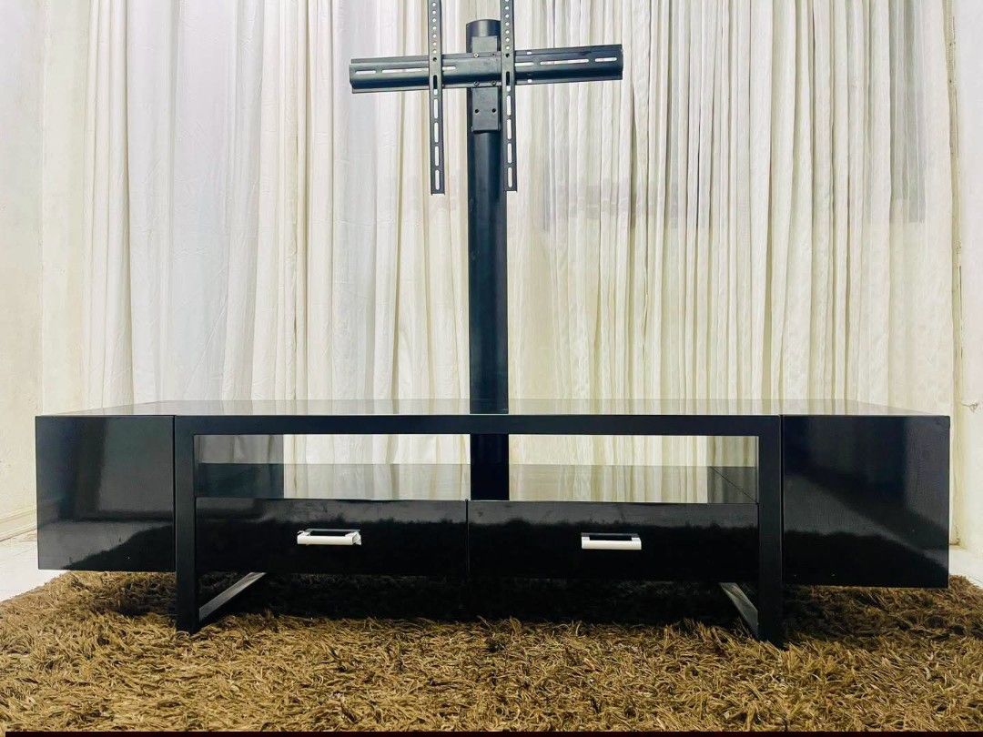 Tv Stand UpTo 80" (Category: TV Consoles) located in Meycauayan. Submitted by marygracecasimiro (Listing ID 1465583208, Image 1). Description: From Taiwan TV Floor Standing Rack up to 80 inches Flat/curve screen tv Dimension : 180(W)x50(D)x133(H)CM TV Size: 32" ~ 80’ Available color: Black Material: Piano finish wood Wire management Metal post and TV mount Get this for only 12k💜💜.