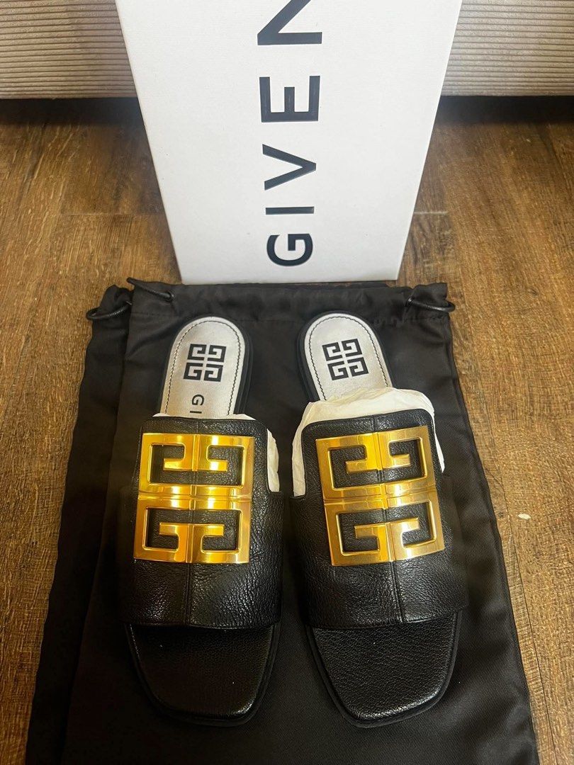 Two Givenchy Flat Sandals with Gold Hardware (Category: Flats & Sandals) located in Quezon City. Submitted by hellopatchi (Listing ID 1465593673, Image 1). Description: Take both Size 36 - Brand: Givenchy - Style: Flat slides / slip-on with modern square toe - Material: Black textured leather - Hardware: Large gold metal 4G logo plaque on front strap - Condition: Brand new, never worn out (clean white insoles) - Inclusions: Original black dust ba