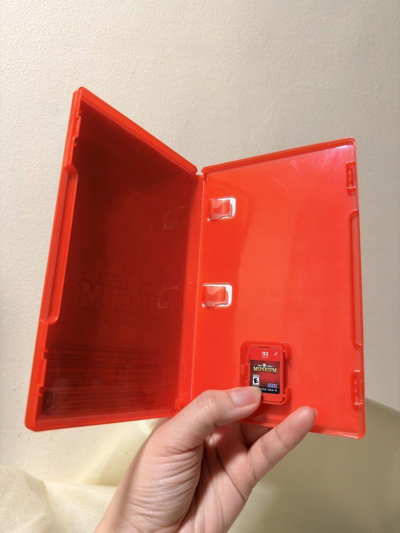 Two Point Museum Explorer Edition Nintendo Switch 2 (Category: Nintendo) located in Rizal. Submitted by jynnnncd (Listing ID 1465736980, Image 2). Description: - Title: Two Point Museum Explorer Edition - Platform: Nintendo Switch 2 - Format: Physical game case with cartridge included (Game-key card version requiring download) - ESRB Rating: E for Everyone - Condition: Red plastic case in clean condition, opened only to check contents.