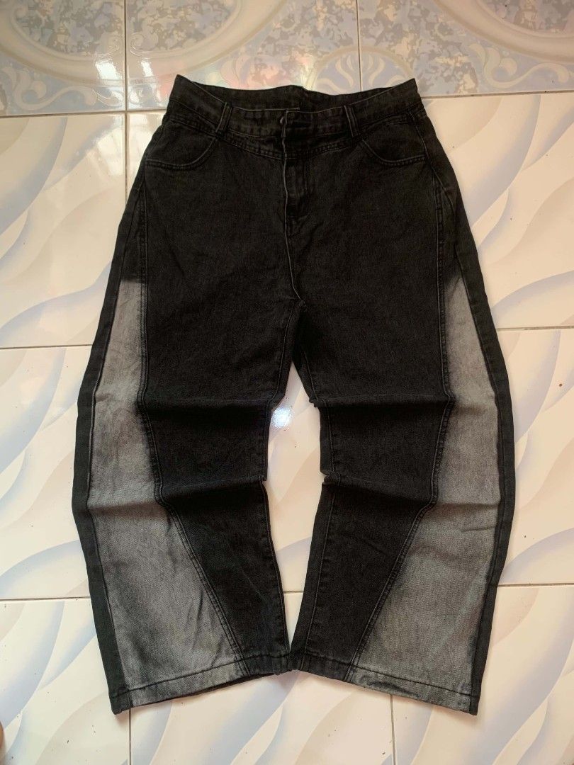 Two-tone Black Denim Pants Straight Leg (Category: Jeans) located in Calamba. Submitted by glennkun192535 (Listing ID 1465628874, Image 1). Description: - Color: Black with contrasting faded grey side panels - Fit: Wide leg, relaxed streetwear style - Waist: Button closure with belt loops - Pockets: Standard back pockets - Wash: Clean dark wash upper with gradient inserts.
