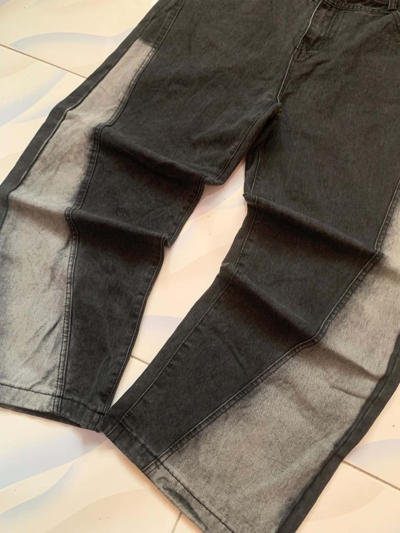 Two-tone Black Denim Pants Straight Leg (Category: Jeans) located in Calamba. Submitted by glennkun192535 (Listing ID 1465628874, Image 3). Description: - Color: Black with contrasting faded grey side panels - Fit: Wide leg, relaxed streetwear style - Waist: Button closure with belt loops - Pockets: Standard back pockets - Wash: Clean dark wash upper with gradient inserts.
