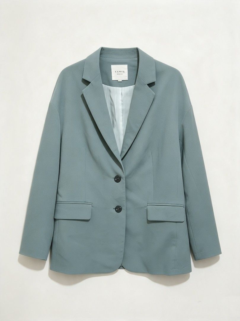 Two-tone Black Grey Blazer Single Button (Category: Coats, Jackets and Outerwear) located in Manila. Submitted by peptaura (Listing ID 1465599339, Image 3). Description: - Color: Black and dark grey with diagonal color block split - Closure: Single front button - Details: Structured lapels and two front flap pockets - Lining: Clean, fully lined interior - Fit: True to size - Styling: Ideal for workwear or evening layering.