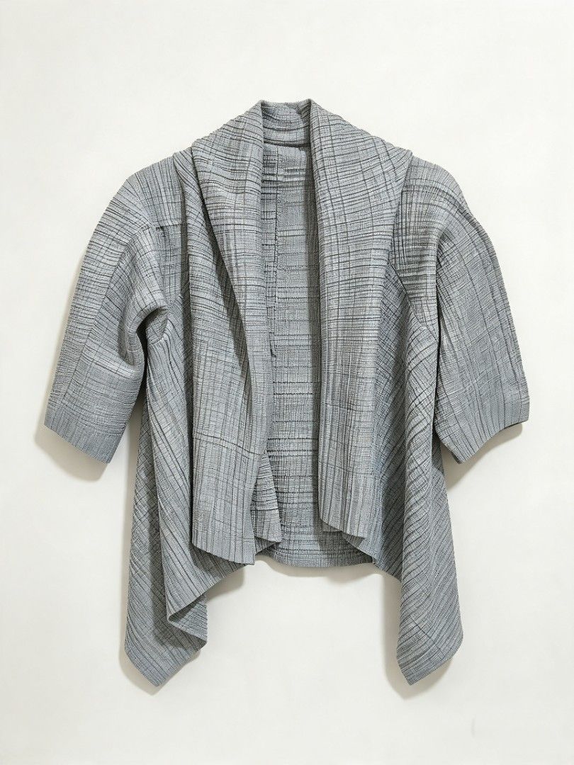 Two-tone Black Grey Blazer Single Button (Category: Coats, Jackets and Outerwear) located in Manila. Submitted by peptaura (Listing ID 1465599339, Image 2). Description: - Color: Black and dark grey with diagonal color block split - Closure: Single front button - Details: Structured lapels and two front flap pockets - Lining: Clean, fully lined interior - Fit: True to size - Styling: Ideal for workwear or evening layering.