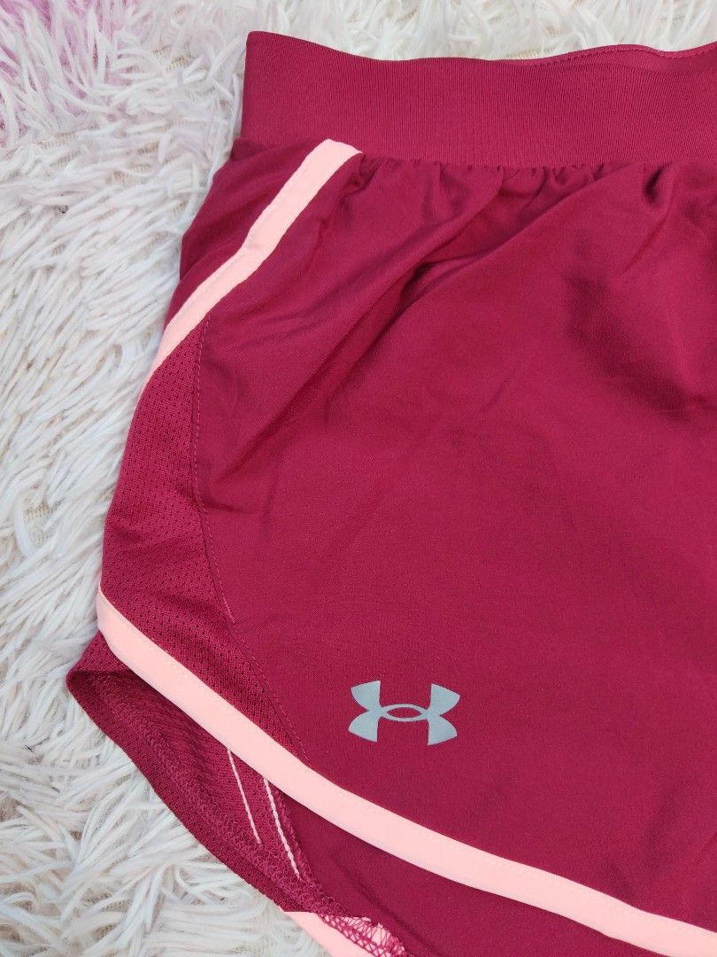 Under Armour Fly By 2.0 Running Shorts (Category: Shorts) located in Siquijor. Submitted by thesummit26 (Listing ID 1465709608, Image 2). Description: • Classic athletic wear. Rich maroon/burgundy base color with light pink trim detailing..